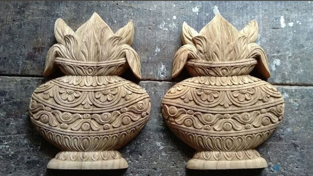 Pair of hand-carved wooden kalash finials with lotus crowns