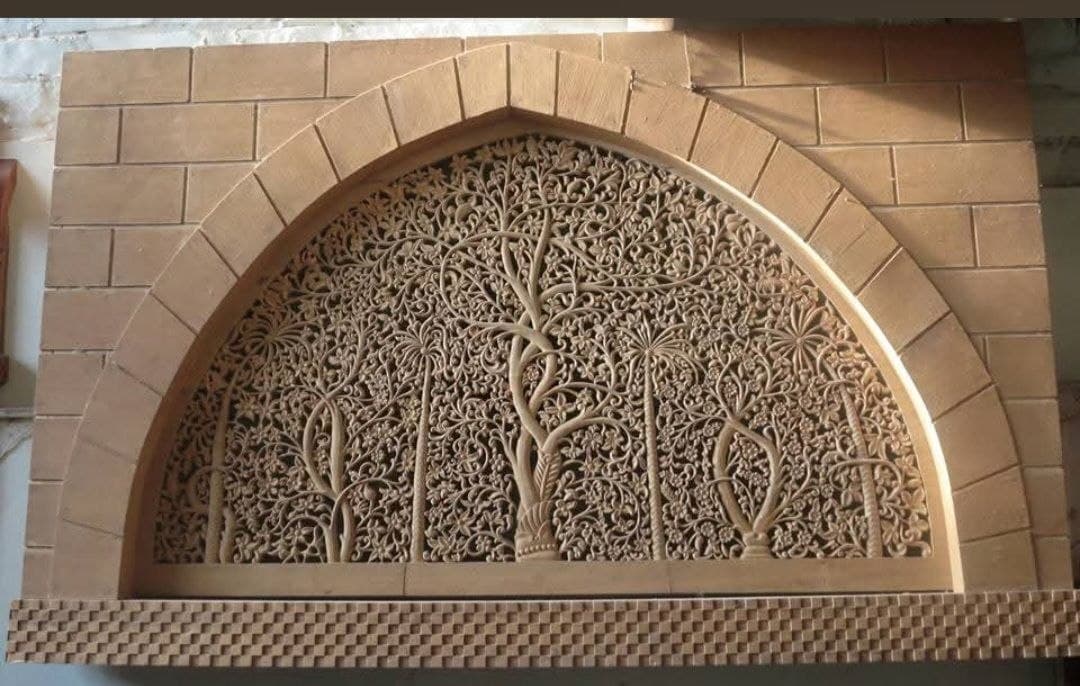 Custom carved wooden arch panel with tree-of-life jaali latticework