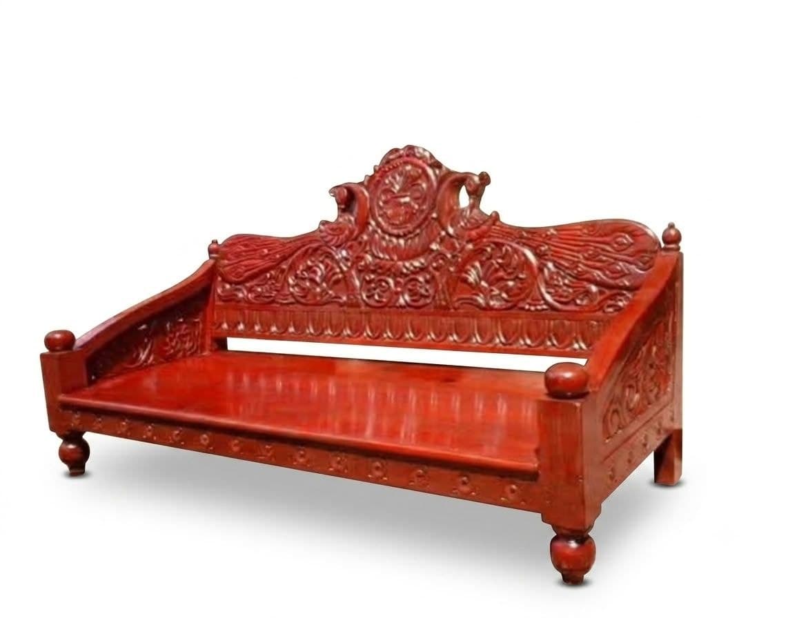 Heritage wooden daybed with ornately carved backrest